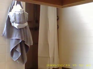 Spying sexy 19 year old girl showering in dorm bathroom