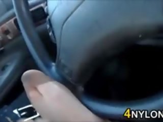 Teasing Her Feet In Pantyhose In A Car